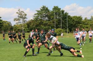 北海道大学とニューイングランド大学の試合写真